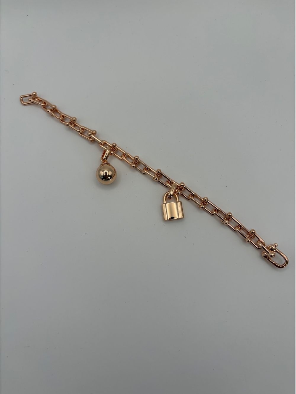 Rose Gold Chain Bracelet with Lock and Sphere Charms